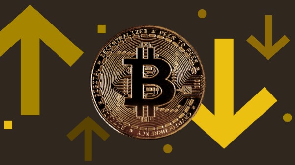 比特币标识与价格涨跌方向的主题示意图
